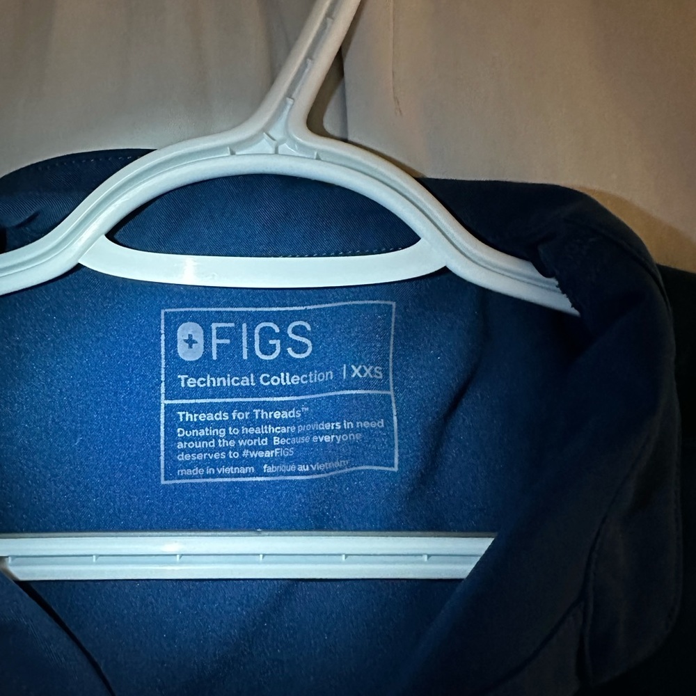 Figs set top and bottom. Color deep reef. Size XXS-petite